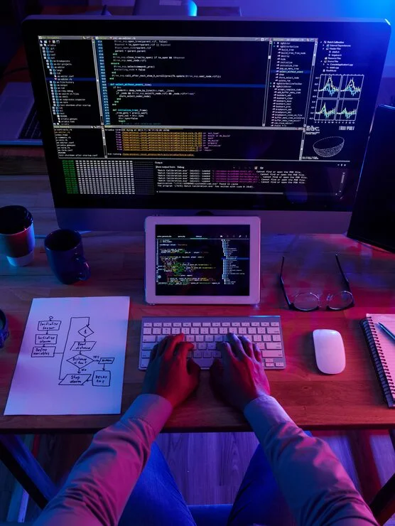 top-view-unrecognizable-hacker-performing-cyberattack-night_1098-18706